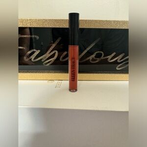 ELLEN TRACY LIP GLOSS